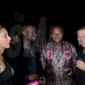 Winston Sill/Freelance Photographer
Smirnoff Dream Weekend Launch Party, held at Caymanas  Estate, St. Catherine on Saturday night June 29, 2013. Here are Ayesha Creary (left); Garth Walker (second left); Don Creary (second right); and Brian Pengelley (right), President, JMA.