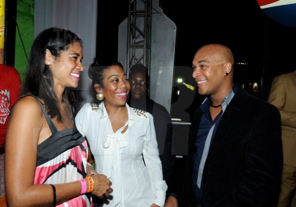 Winston Sill/Freelance Photographer
Smirnoff Dream Weekend Launch Party, held at Caymanas  Estate, St. Catherine on Saturday night June 29, 2013. Here are Catherine Goodhall (left), of Pepsi; Robynne Wong (centre); and Ron Burke (right).