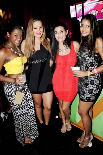 Winston Sill/Freelance Photographer
Smirnoff Dream Weekend Launch Party, held at Caymanas  Estate, St. Catherine on Saturday night June 29, 2013. Here are Ashley Henry (left); Lee-Ann Brandon (second left); Sabina Sirgany (second right); and Renee Davis (right).