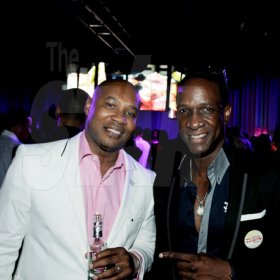 Winston Sill/Freelance Photographer
Smirnoff Dream Weekend Launch Party, held at Caymanas  Estate, St. Catherine on Saturday night June 29, 2013. Here are Jomo Cato (left), of Red Stripe; and Philip Palmer (right).