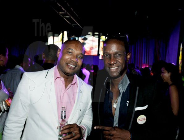 Winston Sill/Freelance Photographer
Smirnoff Dream Weekend Launch Party, held at Caymanas  Estate, St. Catherine on Saturday night June 29, 2013. Here are Jomo Cato (left), of Red Stripe; and Philip Palmer (right).