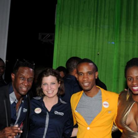 Winston Sill/Freelance Photographer
Smirnoff Dream Weekend Launch Party, held at Caymanas  Estate, St. Catherine on Saturday night June 29, 2013. Here are Philip Palmer (left); Jinx-?? (lsecond left); Jermaine Bibbons (centre), Brand Manager, Smirnoff; Carla Hollingsworth?? (second right), of Pepsi; and Stephen Price (right).