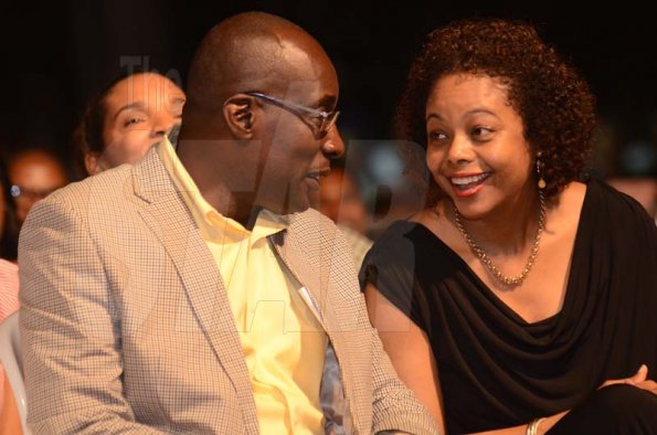 Shorn Hector/Photographer  Minister of Education the Hon. Ruel Reid and Attorney General, Marlene Malahoo Forte smiling during light conversation  at the Seville Emancipation Jubilee 2018