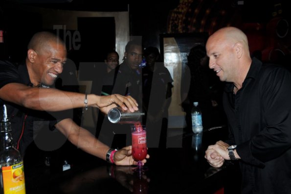 Winston Sill/Freelance Photographer
Kingston Live Entertainment (KLE) group presents the Opening of Famous Nightclub, held at Port Henderson Road, Naggo Head, Portmore on Friday night May 17, 2013. Here are Gary Dixon (left), of Appleton Rums; and Gary Matalon (right), of KLE Group.