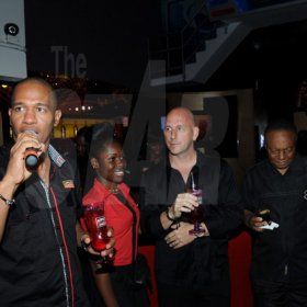 Winston Sill/Freelance Photographer
Kingston Live Entertainment (KLE) group presents the Opening of Famous Nightclub, held at Port Henderson Road, Naggo Head, Portmore on Friday night May 17, 2013. Here are Gary Dixon (left), of Appleton Rums; Natasha Wilson (second left); Gary Matalon (centre), of KLE Group; and George Lee (right), Mayor of Portmore.