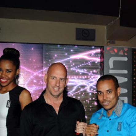 Winston Sill/Freelance Photographer
Kingston Live Entertainment (KLE) group presents the Opening of Famous Nightclub, held at Port Henderson Road, Naggo Head, Portmore on Friday night May 17, 2013. Here are Gary Matalon (black shirt), and Carlo Redwood (blue shirt), of LIME, pose the LIME Girls.