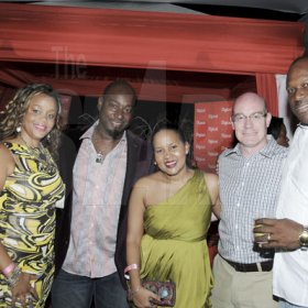 Winston Sill/Freelance Photographer
J Wray and Nephew's Andrew Price (right) hangs with fab couples Kimisha (left) and Garth Walker (second left) and Shelly-Ann and Stephen Curran.
*****************************************************************

Flairtatious party held at Guardsman Group on Saturday October 22, 2011.