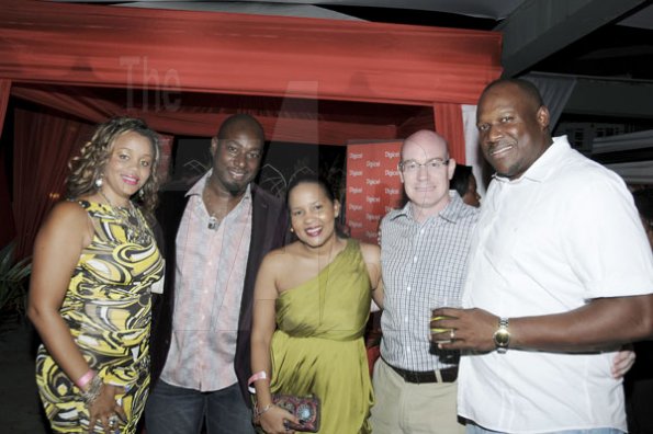 Winston Sill/Freelance Photographer
J Wray and Nephew's Andrew Price (right) hangs with fab couples Kimisha (left) and Garth Walker (second left) and Shelly-Ann and Stephen Curran.
*****************************************************************

Flairtatious party held at Guardsman Group on Saturday October 22, 2011.