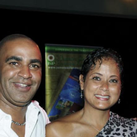 Winston Sill/Freelance Photographer
Chesna Haber (right) lymes with John and Kerry Minott.

Flairtatious party held at Guardsman Group on Saturday October 22, 2011.