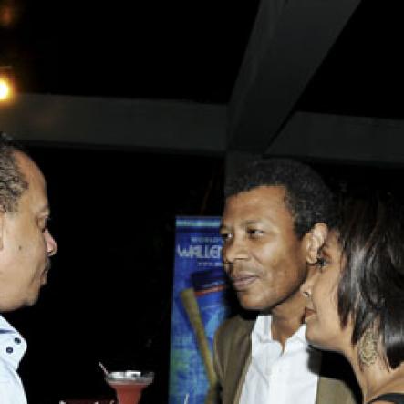 Winston Sill/Freelance Photographer
Gary Barrow (left), wife Bernadette Barrow (second right) and Rejeanne Campbell rap with Wilfred Emmanuel-Jones.

Flairtatious party held at Guardsman Group on Saturday October 22, 2011.