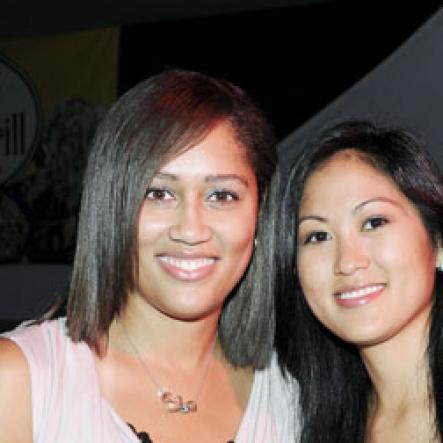 Winston Sill/Freelance Photographer
Red Stripe's Erin Mitchell (left) and Melissa Lue Yen smile for the camera.

Flairtatious party held at Guardsman Group on Saturday October 22, 2011.