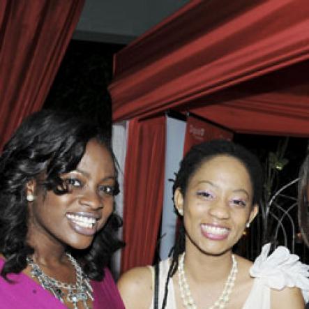 Winston Sill/Freelance Photographer
Digicel trio (from left) Carla Hollingsworth, Tamiann Young and Klao Lewis share a pic.

Flairtatious party held at Guardsman Group on Saturday October 22, 2011.