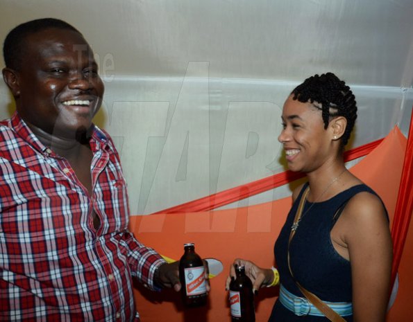 Winston Sill/Freelance Photographer
Red Stripe Footloose Party, the" Mini N' Heels" Edition, held at Mas Camp, Stadium North on Saturday night May 24, 2014. Here are Tyrone Dixon (left), Footloose Promoter; and Toni Ann Reid (right), Assistant Brand Manager, Red Stripe.