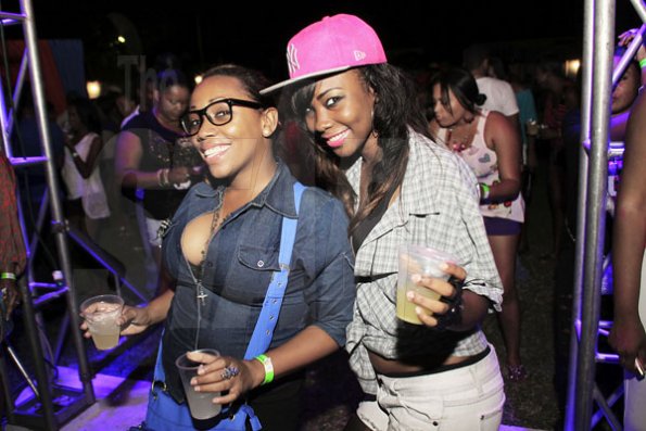 Anthony Minott/Freelance Photographer 
The party vibes were high and so was the mixed liquor, these girls were clearly having a good time at Frenchbook "Booze, shorts and slippers" edition at the East Lawn, Devon House, in St Andrew last Sunday, February 27, 2012.