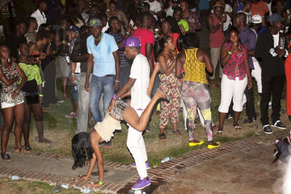 Anthony Minott/Freelance Photographer 
A couple get loose on the lawn during Frenchbook "Booze, shorts and slippers" edition at the East Lawn, Devon House, in St Andrew last Sunday, February 27, 2012.