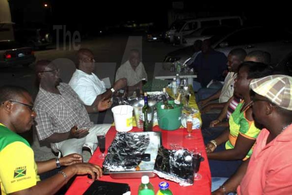 Anthony Minott/Freelance Photographer
Melton Gordon (second left), giving her speech, as guests look on during Lenworth Fulton's birthday party held at Ken's Wildflower Sports Bar and Lounge, Port Henderson Road, Portmore, St Catherine, on Tuesday, September 4, 2012.
