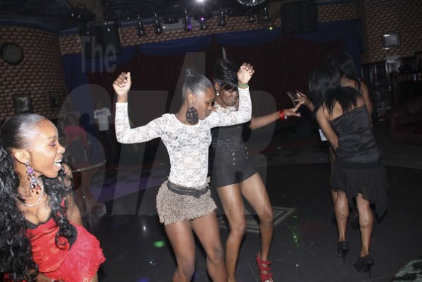 Anthony Minott/Freelance Photographer
Ladies hit the dance floor during Gina's birthday blast at Oneil's Place, 33 Hagley Park Road, St Andrew, on Sunday, February 5, 2012