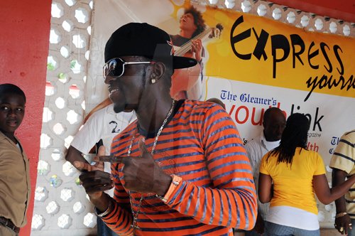 G-Whizz pauses for his adoring fans.

The Gleaner's Champs 100 School Tour pumped high energy into Herbert Morrison Technical High School, in Montego Bay, on Friday, March 12