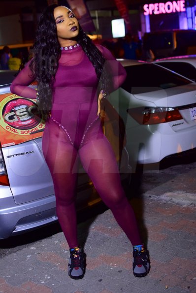 Dancer Danii Boo pose for the camera in a purple outfit designed by Nash Wear