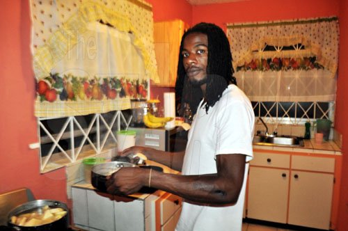 Gyptian places a pot of boiling on water on the stove