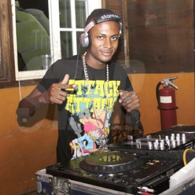 Anthony Minott/Freelance Photographer
DJ Madden in action during Guinness Happy Thursdays  presented by Hapilos Entertainment at the Village Blue Bones Cafe, Barbican Road, in Liguanea, St Andrew on Thursday, September 1, 2011.