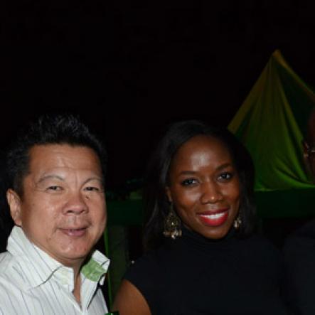 Winston Sill/Freelance Photographer
Red Stripe prsents Heineken World Premiere Party, held at  Fort Rocky, Port Royal on Saturday night November 22, 2014. Here are Brian "Ribbie" Chung (left), Rochelle Clarke (centre), Heineken Country Manager; and Cedric Blair (right) Managing Director, Red Stripe.