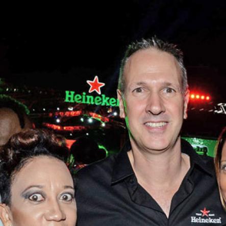 Winston Sill/Freelance Photographer
Red Stripe prsents Heineken World Premiere Party, held at  Fort Rocky, Port Royal on Saturday night November 22, 2014. Here are Dianne Ashton Smith (left), Head of Corporate Relations, Red Stripe; Bruce Kidnor (centre), Finance Director, Red Stripe; and Ayesha Creary (right).