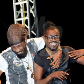 Winston Sill/Freelance Photographer
Surprise guest performer, Spragga Benz brings Beenie Man to the stage, during the Heineken World Premiere Party.