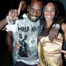 Winston Sill / Freelance Photographer
Mavado hanging out with one of the Hennessy Girls