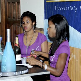 Winston Sill / Freelance Photographer

Title sponsor for the party, Hpnotiq, treated patrons with shots of the liquor.



Hypnotic Vogue Party, held at the Presidential Floor, Sabina Park, on Saturday night February 25, 2012.
