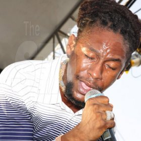 Publication: Daily Star
Photo by Noel Thompson

Reggae singer Jah Cure, giving a sterling performance at Reggae Sumfest International NIght last Friday (July 24, 2009) in Catherine Hall, Montego Bay.