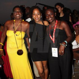 Publication: Something Extra/Social
Photo by Noel Thompson

Friends Sandra Coke (left), singer based in Montego Bay; Yolande Rattray-Wright, (centre), managing director of The Wright Agency and Coleen Douglas (right), communications director with the Jamaica National Heritage Trust, pause for a photo opportunity, at Reggae Sumfest International NIght last Friday (July 24, 2009) in Catherine Hall, Montego Bay.