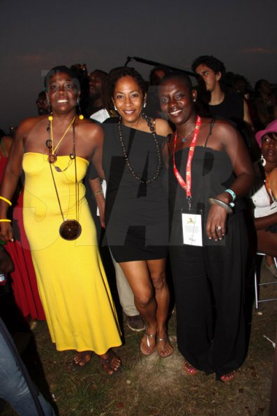 Publication: Something Extra/Social
Photo by Noel Thompson

Friends Sandra Coke (left), singer based in Montego Bay; Yolande Rattray-Wright, (centre), managing director of The Wright Agency and Coleen Douglas (right), communications director with the Jamaica National Heritage Trust, pause for a photo opportunity, at Reggae Sumfest International NIght last Friday (July 24, 2009) in Catherine Hall, Montego Bay.