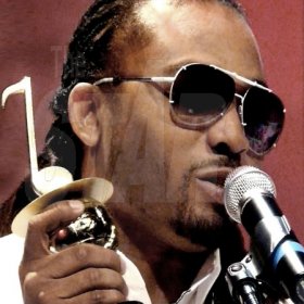 Roland Hyde 
Soca star Machel Montano holds his trophy after winning 'Entertainer of the Year' at the International Reggae And World Musica Award (IRAWMA) at York College Performing Center, on Sunday, May 2.  He also won for 'Most Outstanding Show Band'.