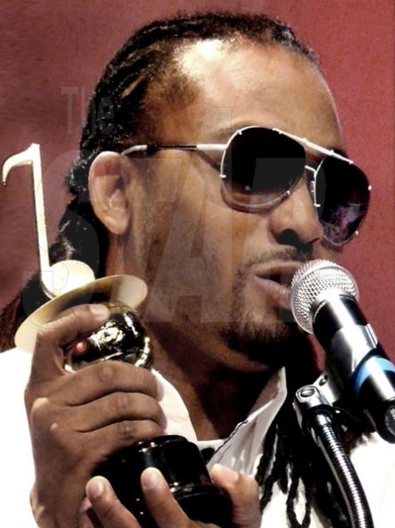 Roland Hyde 
Soca star Machel Montano holds his trophy after winning 'Entertainer of the Year' at the International Reggae And World Musica Award (IRAWMA) at York College Performing Center, on Sunday, May 2.  He also won for 'Most Outstanding Show Band'.