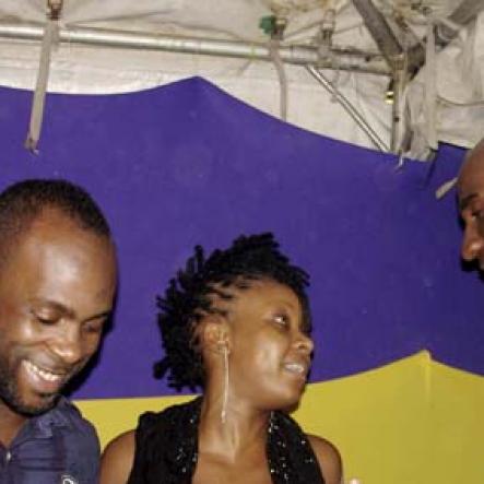 Contributed
Supreme Ventures' Andrei Roper (right) shares a joke with Soca maestro Bunji Garlin and his wife, the soca queen bee, Fay Ann Lyons during the Acropolis Bacchanal J'Ouvert on Friday April 29, at the Mas Camp.