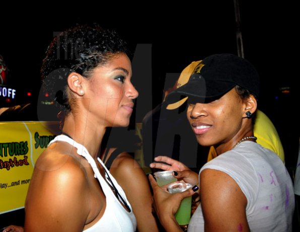 Winston Sill / Freelance Photographer
Bacchanal Jamaica J'ouvert and Road March, held at Mas Camp Village, Oxford Road on Friday night April 29, 2011. Here are Yendi Phillipps (left); and AnnM----?? Golding (right).