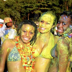 Winston Sill / Freelance Photographer
                                                                                    They certainly enjoyed playing in the paint at Bacchanal Jamaica's Beach J'ouvert at James Bond Beach, Oracabessa, St Mary on Saturday, April 23, 2011.