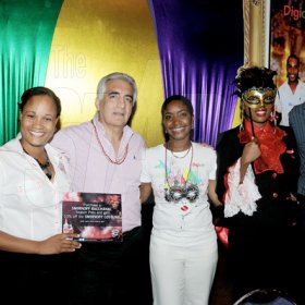 Winston Sill / Freelance Photographer
Bacchanal Jamaica official launch of the 2013 Carnival Season under the theme "Le Masquerade", and willmark the 25th Anniversary of Carnival, held at Knutsford Court Hotel, Ruthven Road on Tuesday night January 29, 2013. Here are Leleika Barnes (left), of Smirnoff; Michael Ammar (second left), Director of Bacchanal Jamaica;  Jackie Burrell-Clarke (centre), of Digicel; Tahnida Nunes (second right), of Digicel; and Ed Khoury (right), Director of Bacchanal Jamaica.