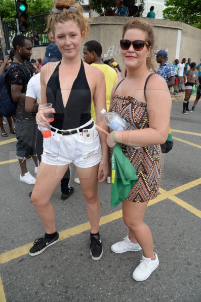 Jermaine Barnaby/Freelance Photographer
Foreign nationals were present taking in the action from revellers at Jamaica carnival road march on Sunday April 23, 2017.