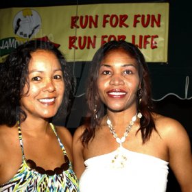 Winston Sill / Freelance Photographer
Angela Knibbs (left) and gal pal Sandy Jones hanging out at the Jamdammers Party, held at the American International School, Olivier Road on Saturday night June 20, 2009.