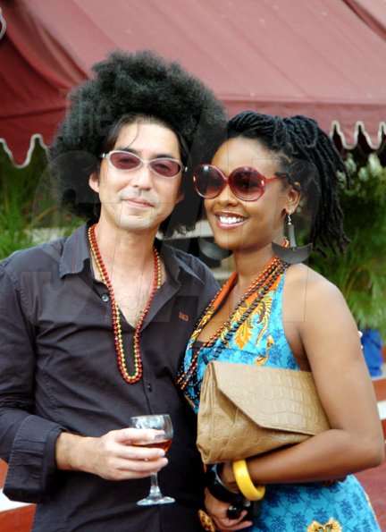 Winston Sill / Freelance Photographer
JPS Chairman Tomofumi Fukuda and radip personality Empress smile for the camera at the Jamaica Public Service Company (JPS) media Christmas party, held at Norbrook Drive, Norbrook on Sunday.

***************************************************************** November 22, 2009.