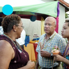 Winston Sill / Freelance Photographer
JPS MoBay's Kathy Cooke (left), jokes with Tony Ray and his daughter Samantha.
************************************************************

Jamaica Public Service Company (JPS) Corporate Commu ication Team host Media Christmas Party, held at Norbrook Drive, Norbrook on Sunday November 22, 2009.