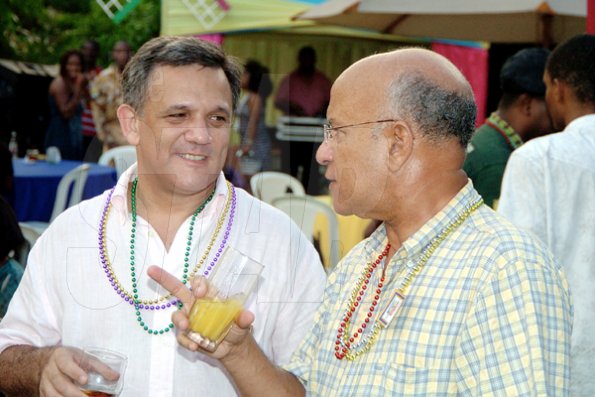 Winston Sill / Freelance Photographer
JPS President Damian Obiglio (left) and Tony Ray talking things over.

*****************************************************************

Jamaica Public Service Company (JPS) Corporate Commu ication Team host Media Christmas Party, held at Norbrook Drive, Norbrook on Sunday November 22, 2009.