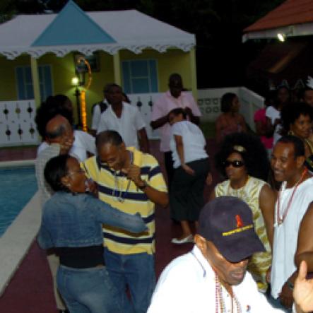 Winston Sill / Freelance Photographer
The dance floor was by the poolside and don't worry, no one fell in.

Jamaica Public Service Company (JPS) Corporate Commu ication Team host Media Christmas Party, held at Norbrook Drive, Norbrook on Sunday November 22, 2009.