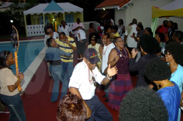 Winston Sill / Freelance Photographer
The dance floor was by the poolside and don't worry, no one fell in.

Jamaica Public Service Company (JPS) Corporate Commu ication Team host Media Christmas Party, held at Norbrook Drive, Norbrook on Sunday November 22, 2009.