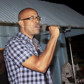 Anthony Minott/Freelance Photographer
SPORTS Max's Lance Whittaker, a veteran Sports Journalist sings during Smirnoff New Star Karaoke at Ken's Wildflower Sports Bar and Lounge, Bayside, Portmore, St Catherine on Monday, September 17, 2012.