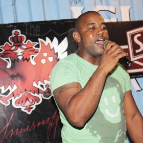 Anthony Minott/Freelance Photographer
Troy does a cover for Sylvia's Mother during Smirnoff New Star Karaoke at Ken's Wildflower Sports Bar and Lounge, Bayside, Portmore, St Catherine on Monday, September 17, 2012.
