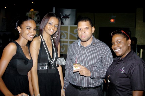 Winston Sill / Freelance Photographer

K.E.M.A. models Debbie-Ann Williams (left) and Shanese Murdock (second left) stop awhile with Paul Cookes, managing director Action Security Company Limited and Karelle Phillips, head of the agency..  



Launch of Karelle Elizabeth Model Agency (KEMA), held at Ficton Night Club, Market Place on Tuesday night December 1, 2009.
