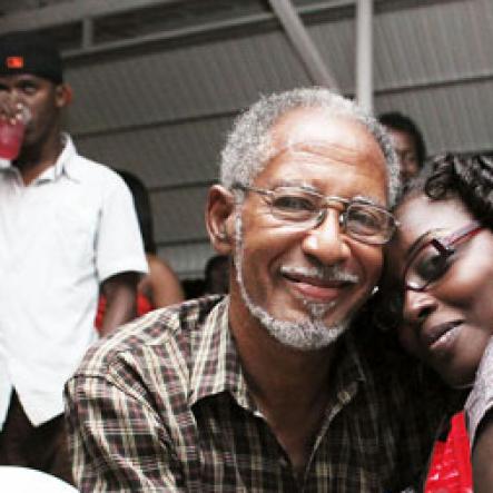 Anthony Minott/Freelance Photographer
Lover's time: a couple embrace during Ken's Wildflower Valentine's Night party atop the roof of Ken's Wildflower Restaurant and Lounge, Port Henderson Road, Portmore Plaza, Tuesday, February 14, 2012.